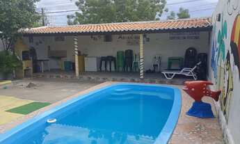Imagem 4: Área de lazer com piscina e casa