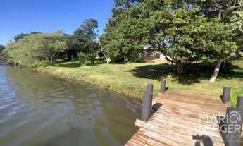 Imagem 2: Residencia Ecovillas do Lago na água com diferencial