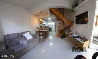 Imagem 2: Casa em Porto Alegre, no bairro Ponta Grossa, com 2 dormitório(s), e 2 banheiros