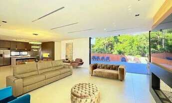 Imagem 5: Casa de Alto Padrão com 4 Suítes, Piscina Privativa e Infraestrutura Completa