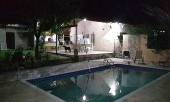 Imagem 3: Chácara para venda possui 150 metros quadrados com 3 quartos