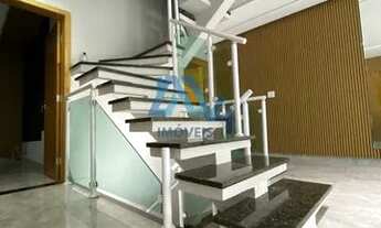 Imagem 5: Residência de Luxo: 4 Suítes, Churrasqueira e Móveis Planejados de Alto Padrão"