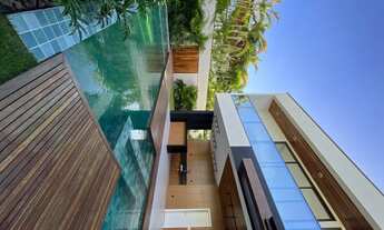 Imagem 5: Casa para venda com 319 metros quadrados com 4 suítes na Cidade Alpha - Ceará