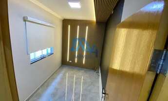 Imagem 7: Residência de Luxo: 4 Suítes, Churrasqueira e Móveis Planejados de Alto Padrão"