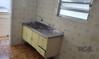 Imagem 3: Apartamento 1Dormitório desocupado na Venâncio Aires piso parquêt ensolarado área de servi