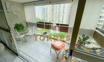 Imagem 2: Apartamento na Praia das Pitangueiras no Guarujá completo com 3 quartos, garagem e área de