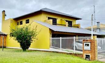 Imagem 2: Sobrado mobiliado com 03 dormitórios à venda no Centro de Xangri-Lá/RS