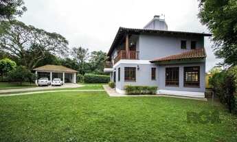 Imagem 2: Sobrado com 6 suites, lareira, lavabo, pátio - Bairro Belém Velho