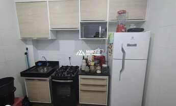 Imagem 5: Vendo apartamento no 2º andar com 2 quartos, armários planejados na cozinha e
