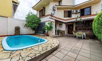 Imagem: Casa com 3 suítes, 4 vagas e pátio com