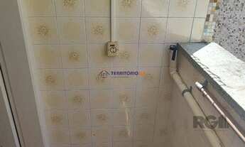 Imagem 6: Apartamento 1Dormitório desocupado na Venâncio Aires piso parquêt ensolarado área de servi