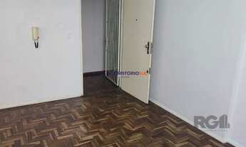 Imagem 4: Apartamento 1Dormitório desocupado na Venâncio Aires piso parquêt ensolarado área de servi