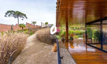 Imagem 3: Casa em condomínio terreno 6.328,86m², piscina e lago ornamental!