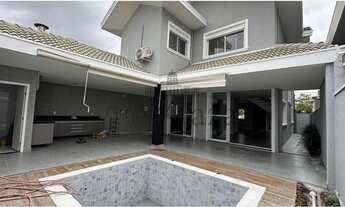 Imagem 2: Casa de condomínio para venda com 301 metros quadrados com 4 quartos