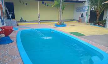 Imagem 5: Área de lazer com piscina e casa