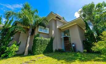 Imagem 6: Casa de condomínio para venda tem 605 metros quadrados com 4 quartos