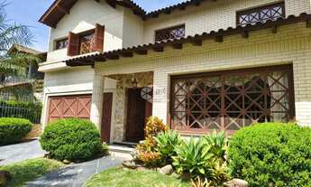 Imagem: Casa com 3 dormitórios e piscina, bairro