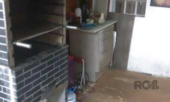 Imagem 4: Ampla casa de 180m² com 2 dormitórios e churrasqueira