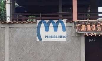 Imagem: Ampla casa linear, próxima aos prédios