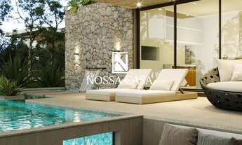 Imagem 2: Belo sobrado com 4 suítes, lavabo, amplo living integrando com espaço gourmet, no condomín