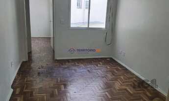 Imagem 2: Apartamento 1Dormitório desocupado na Venâncio Aires piso parquêt ensolarado área de servi