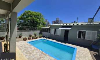 Imagem 5: Casa 4 Dormitórios 1 suite 3 banheiros piscina e churasqueira