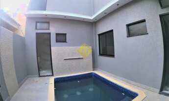 Imagem 7: Casa com piscina e cozinha planejada com 1 suite e 2 quartos