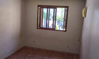 Imagem 7: Casa com dois quartos, garagem, pátio e churrasqueira