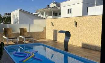 Imagem 3: Casa com 4 dormitórios, sendo 3 suítes, garagens para 2 carros