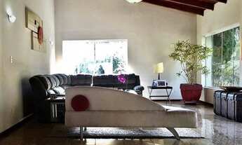 Imagem 7: Casa de condomínio para venda possui 470 metros quadrados com 5 quartos