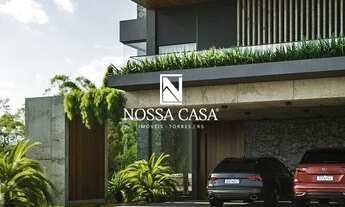 Imagem 6: Belo sobrado com 4 suítes, lavabo, amplo living integrando com espaço gourmet, no condomín