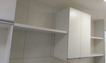 Imagem 2: Apartamento com 3 quartos sendo 1 suíte, já com móveis fixos, andar intermediário de frent