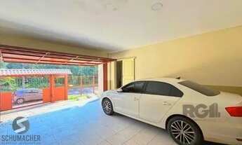 Imagem 5: Casa em Porto Alegre, no bairro Nonoai, com 4 dormitório(s), à venda