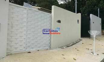 Imagem 2: Casa em meio lote