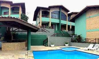 Imagem 2: Casa de condomínio para venda possui 105 metros quadrados com 3 quartos, sendo 2 suites