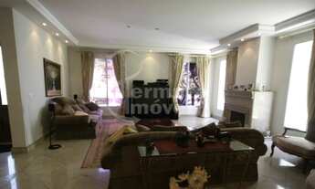 Imagem 5: Casa para venda com 918m², 4 suítes, piscina, jardim, área de lazer, salão de festas no Ta