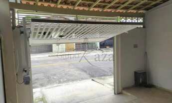 Imagem 3: Casa Térrea em meio lote a venda 3 quartos 2 Garagem Portão Automático Basculante Jardim