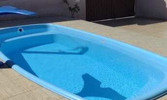 Imagem 5: Casa térrea para venda com 3 dormitórios e piscina em Jardim Icaraiba - Peruíbe - SP