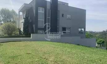 Imagem 2: Casa para venda com 465m², 4 suítes, 3 vagas de garagem, piscina e sala de ginástica no Re