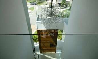 Imagem 5: Casa para venda mobiliada com 480m², 4 suítes, 6 vagas e jardim no Residencial Villa Solai