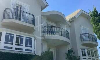 Imagem 2: Casa para venda com 650m², 4 suítes, piscina, quadra e sauna no Residencial Tamboré 3 em A