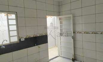 Imagem 7: Casa Térrea em meio lote a venda 3 quartos 2 Garagem Portão Automático Basculante Jardim