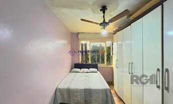 Imagem 2: Casa em Porto Alegre, no bairro Cavalhada, com 4 dormitório(s), e 4 banheiros, à