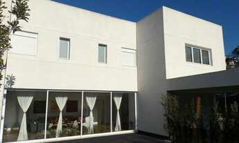 Imagem 3: Casa para venda com 440m², 4 suítes, 4 vagas, escritório, sala de TV e espaço gourmet no T