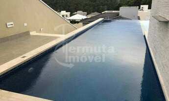 Imagem 2: Casa para venda mobiliada com 470m², 4 suítes, 5 banheiros e piscina no Residencial Villa