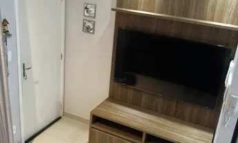 Imagem 2: Apartamento com dois dormitórios, sala, cozinha, área de serviço, banheiro e uma vaga de g