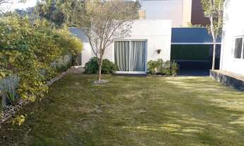 Imagem 5: Casa para venda com 440m², 4 suítes, 4 vagas, escritório, sala de TV e espaço gourmet no T