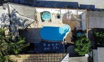 Imagem 6: Casa com quatro quartos e piscina à venda no Rio Tavares