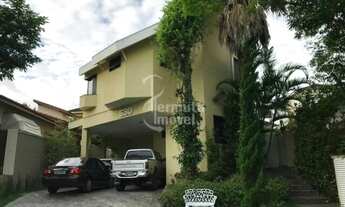 Imagem 2: Casa para venda com 375m², 4 dormitórios, 2 suítes, 6 banheiros, 4 vagas, e ampla área gou