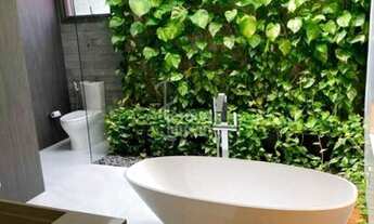 Imagem 2: Casa à venda com 535 m²; 5 suítes, lareira, cozinha, sala de estar e 6 vagas de garagem no